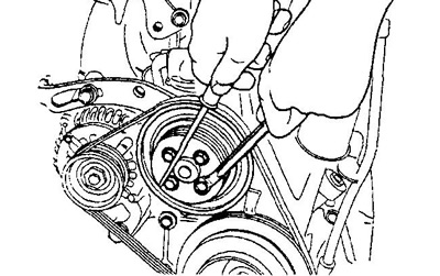 3. Снимите шкив насоса охлаждающей жидкости, зафиксировав шкив от поворота отверткой.
