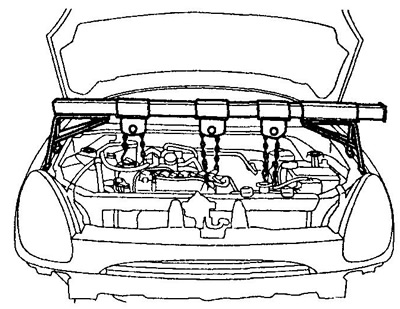 1. Подвесьте двигатель на таль.