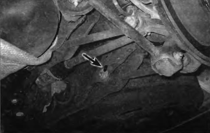 Рис. 12.12. Эксцентриковый болт с отметкой его положения относительно задней поперечины