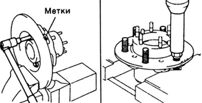 г) С помощью удлинителя и пресса произведите выпрессовку болтов ступицы.