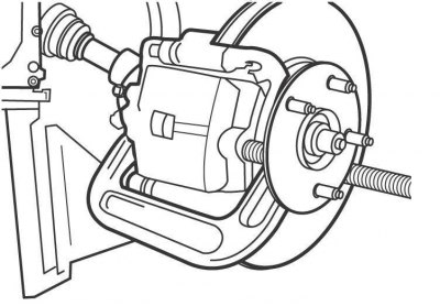 Рис. 11.13. Использование струбцины для вдавливания поршня в суппорт