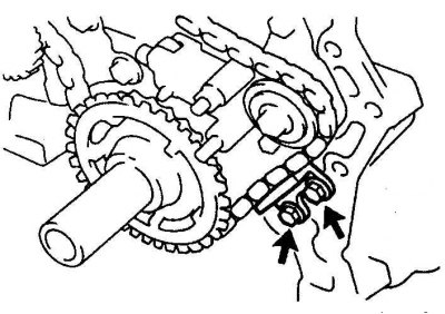 4. Отверните болты (указаны стрелками) и снимите успокоитель N3.