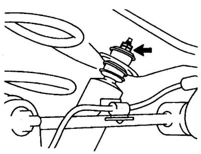 3. Отверните гайку верхнего крепления (указана стрелкой). Для этого гайку зафиксируйте ключом, а…